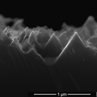 Rice scientists have reduced to one step the process to turn silicon wafers into the black silicon used in solar cells. Here, a cross section shows inverted pyramids etched into silicon by a chemical mixture over eight hours. Courtesy of the Barron Group - See more at: http://news.rice.edu/2014/06/19/one-step-to-solar-cell-efficiency-2/#sthash.tAiqnM7a.dpuf